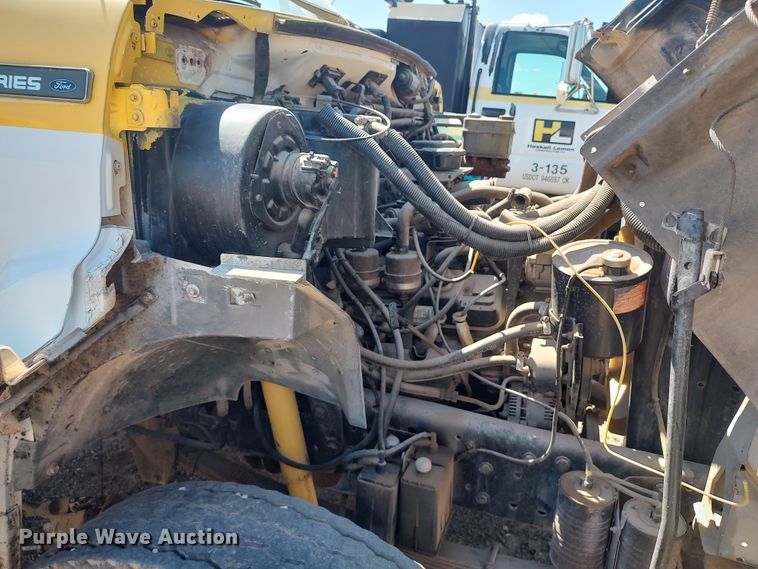 image for item JX9255 1996 Ford F700  dump flatbed truck