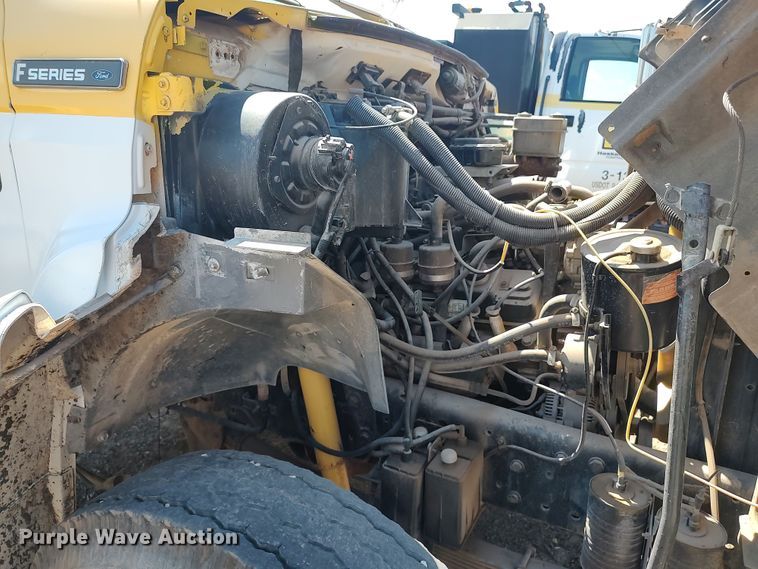 image for item JX9255 1996 Ford F700  dump flatbed truck