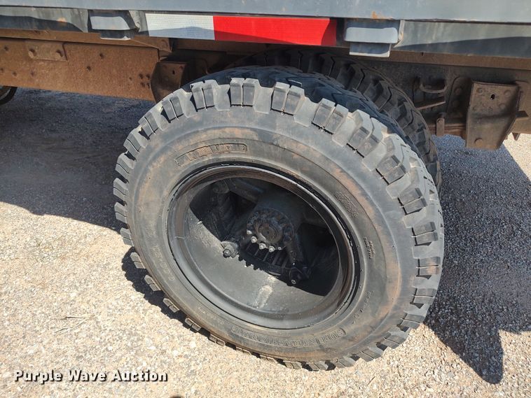 image for item JX9255 1996 Ford F700  dump flatbed truck