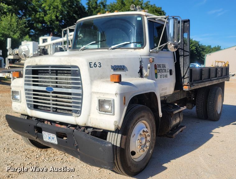image for item LM9705 1991 Ford LN8000  dump flatbed truck
