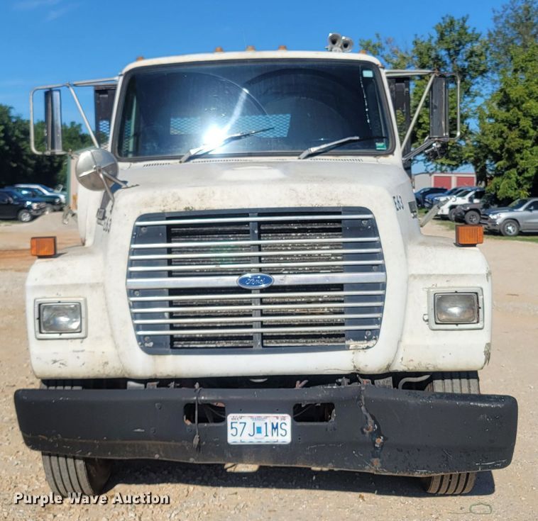 image for item LM9705 1991 Ford LN8000  dump flatbed truck