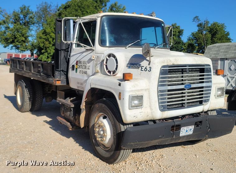 image for item LM9705 1991 Ford LN8000  dump flatbed truck