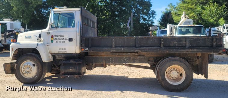 image for item LM9705 1991 Ford LN8000  dump flatbed truck