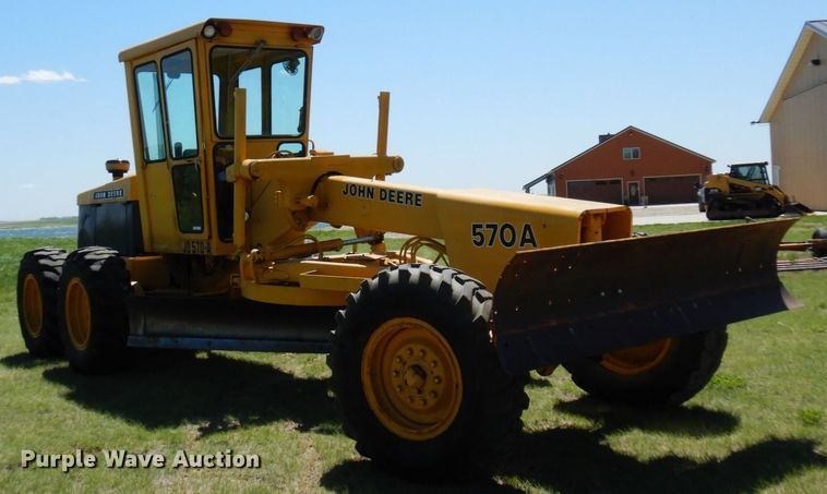 image for item MF9618 1981 John Deere 570A  rigid frame motor grader