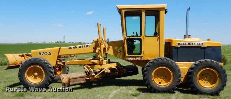 image for item MF9618 1981 John Deere 570A  rigid frame motor grader