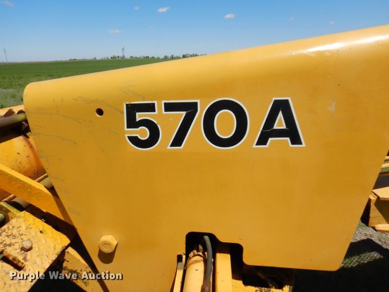 image for item MF9618 1981 John Deere 570A  rigid frame motor grader