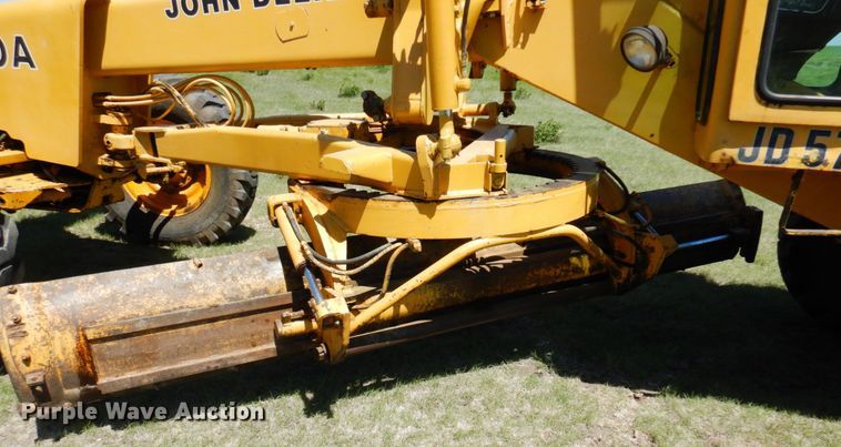 image for item MF9618 1981 John Deere 570A  rigid frame motor grader