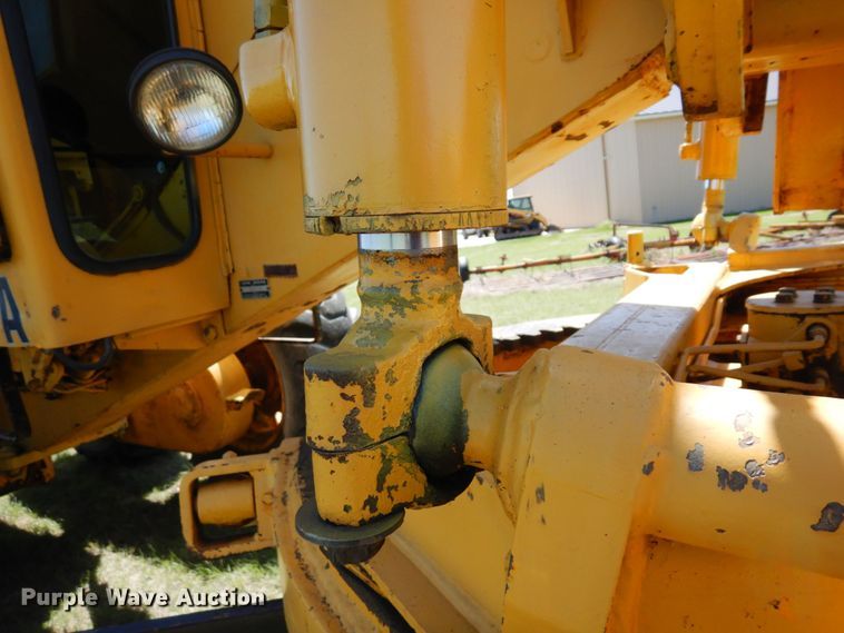 image for item MF9618 1981 John Deere 570A  rigid frame motor grader