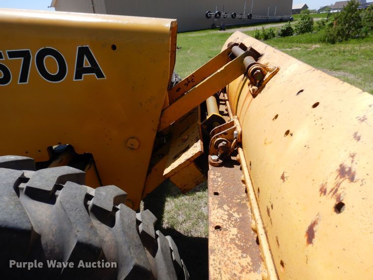 image for item MF9618 1981 John Deere 570A  rigid frame motor grader