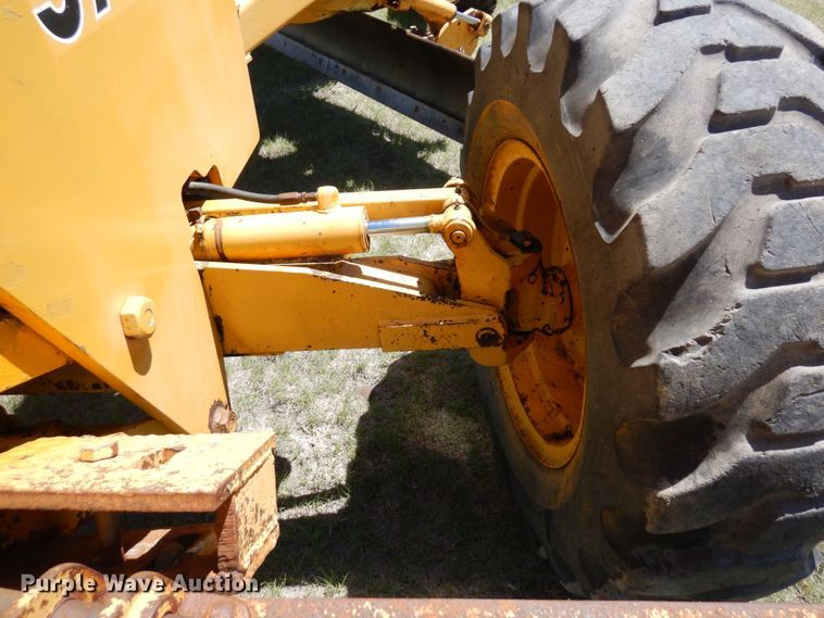 image for item MF9618 1981 John Deere 570A  rigid frame motor grader