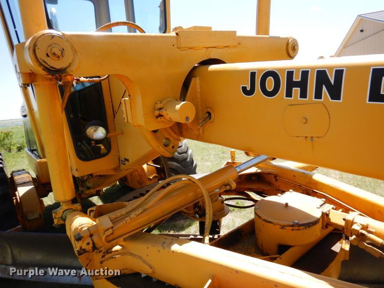 image for item MF9618 1981 John Deere 570A  rigid frame motor grader