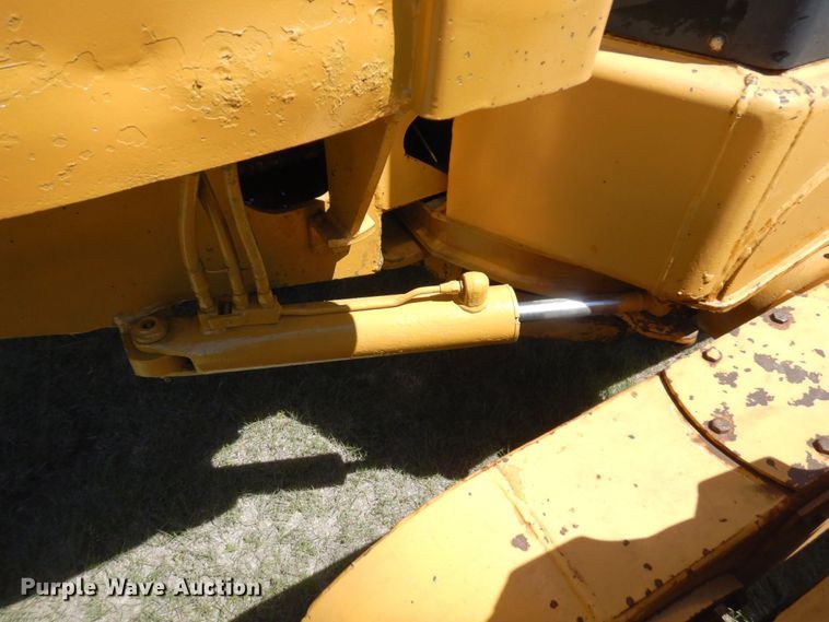 image for item MF9618 1981 John Deere 570A  rigid frame motor grader