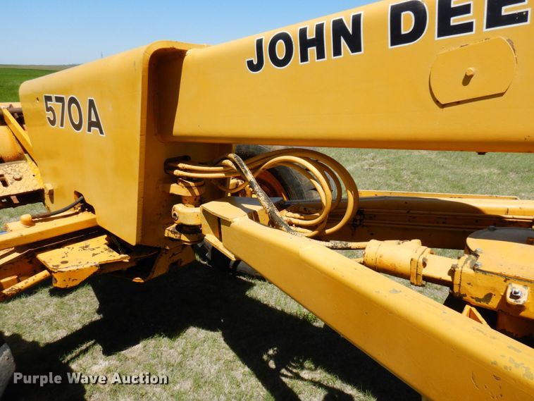 image for item MF9618 1981 John Deere 570A  rigid frame motor grader