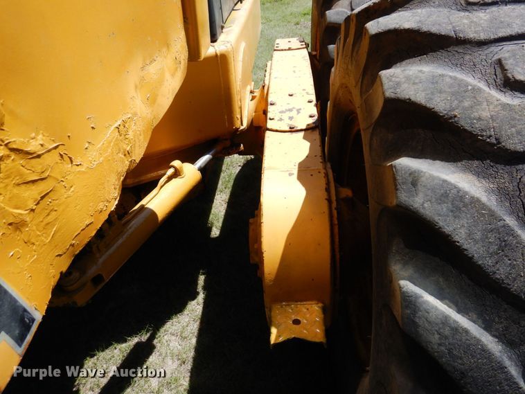 image for item MF9618 1981 John Deere 570A  rigid frame motor grader