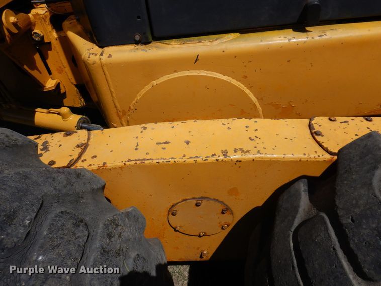 image for item MF9618 1981 John Deere 570A  rigid frame motor grader