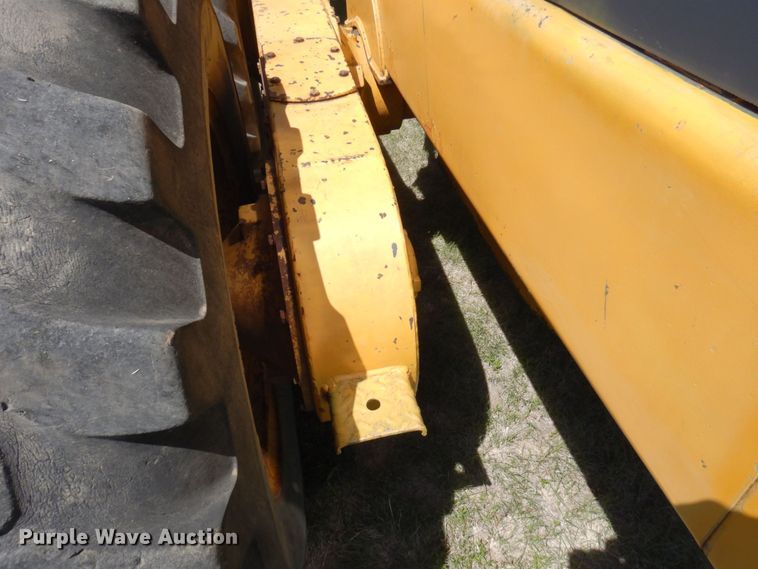 image for item MF9618 1981 John Deere 570A  rigid frame motor grader