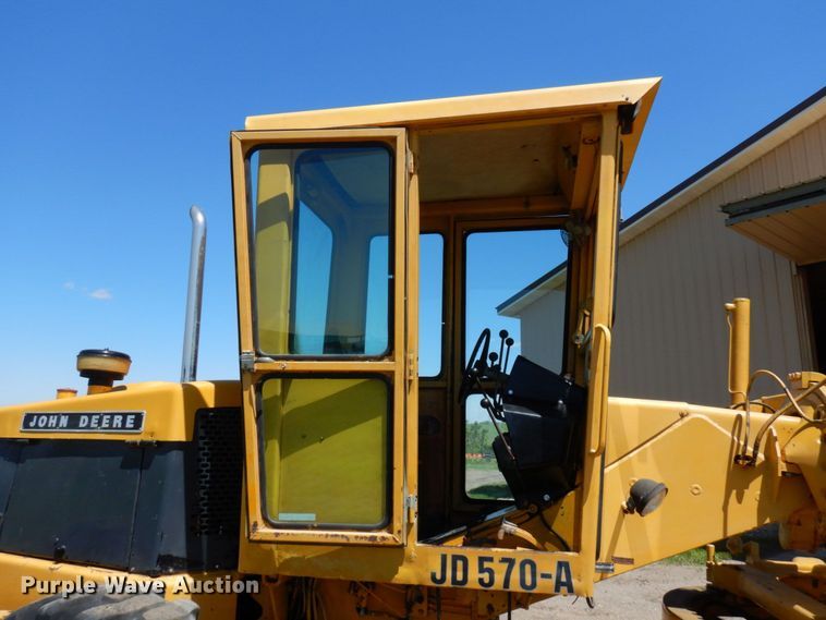 image for item MF9618 1981 John Deere 570A  rigid frame motor grader