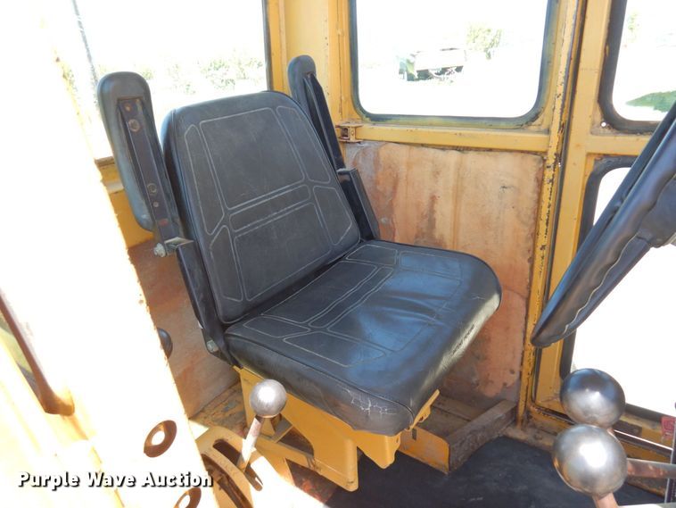 image for item MF9618 1981 John Deere 570A  rigid frame motor grader