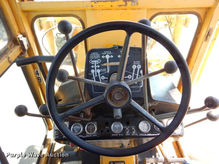 image for item MF9618 1981 John Deere 570A  rigid frame motor grader