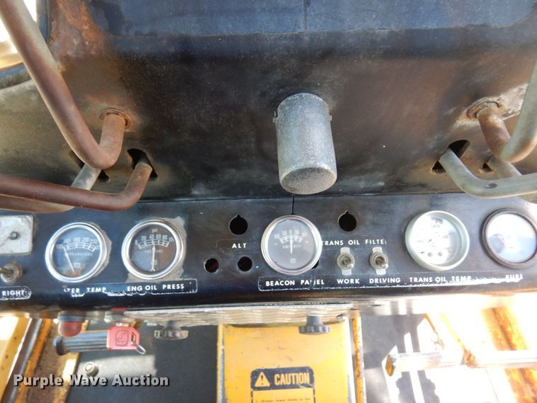 image for item MF9618 1981 John Deere 570A  rigid frame motor grader