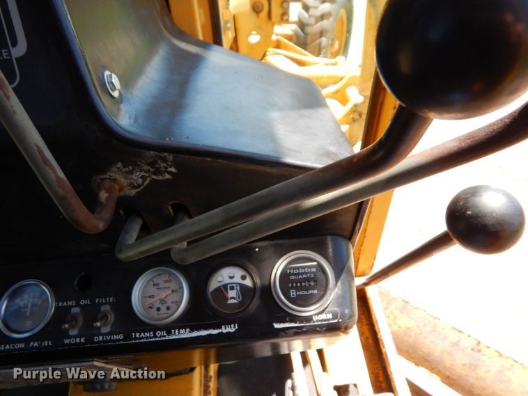 image for item MF9618 1981 John Deere 570A  rigid frame motor grader