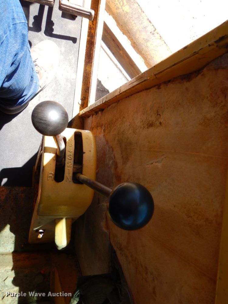 image for item MF9618 1981 John Deere 570A  rigid frame motor grader