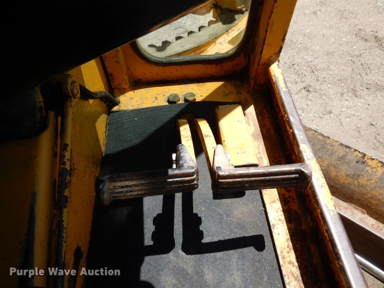 image for item MF9618 1981 John Deere 570A  rigid frame motor grader