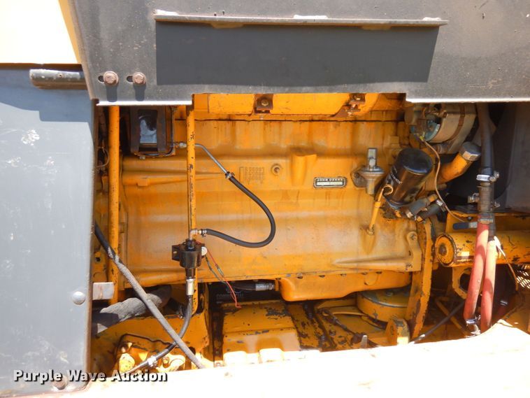 image for item MF9618 1981 John Deere 570A  rigid frame motor grader