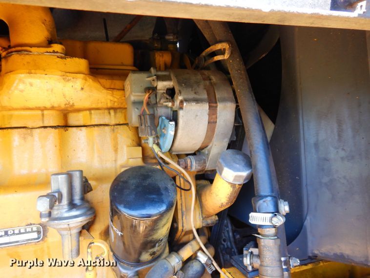 image for item MF9618 1981 John Deere 570A  rigid frame motor grader