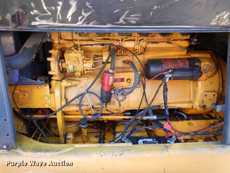 image for item MF9618 1981 John Deere 570A  rigid frame motor grader