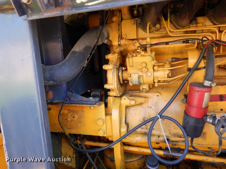 image for item MF9618 1981 John Deere 570A  rigid frame motor grader