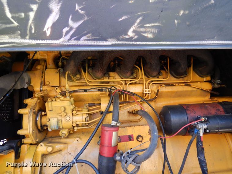 image for item MF9618 1981 John Deere 570A  rigid frame motor grader