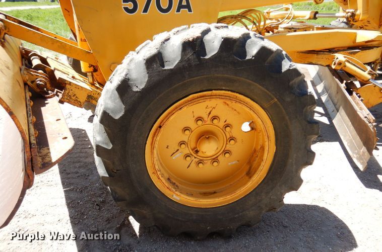 image for item MF9618 1981 John Deere 570A  rigid frame motor grader