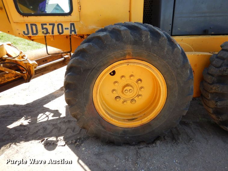 image for item MF9618 1981 John Deere 570A  rigid frame motor grader