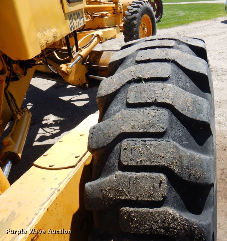 image for item MF9618 1981 John Deere 570A  rigid frame motor grader