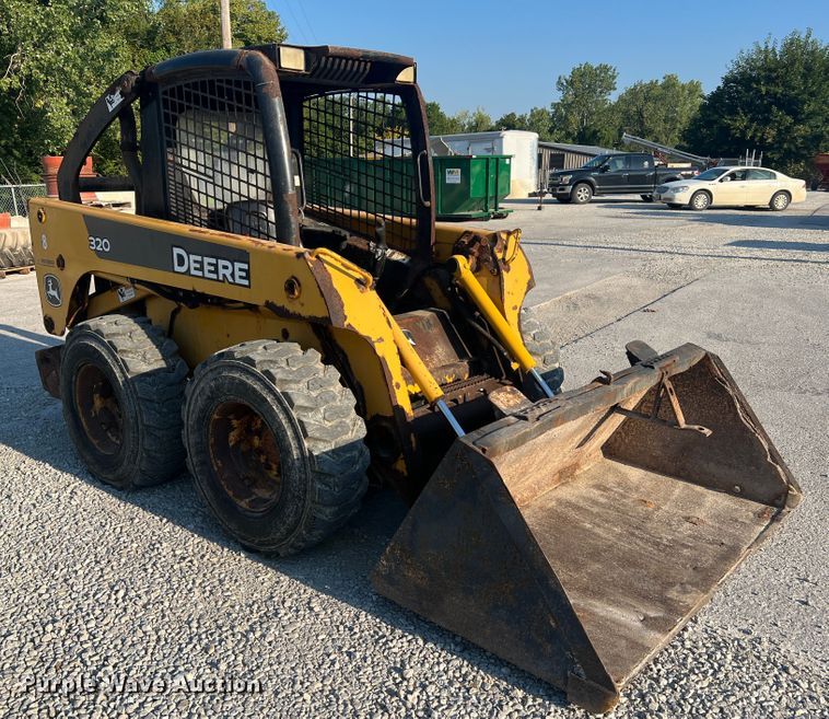 image for item MR9801 John Deere 320  skid steer loader