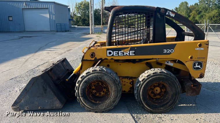 image for item MR9801 John Deere 320  skid steer loader