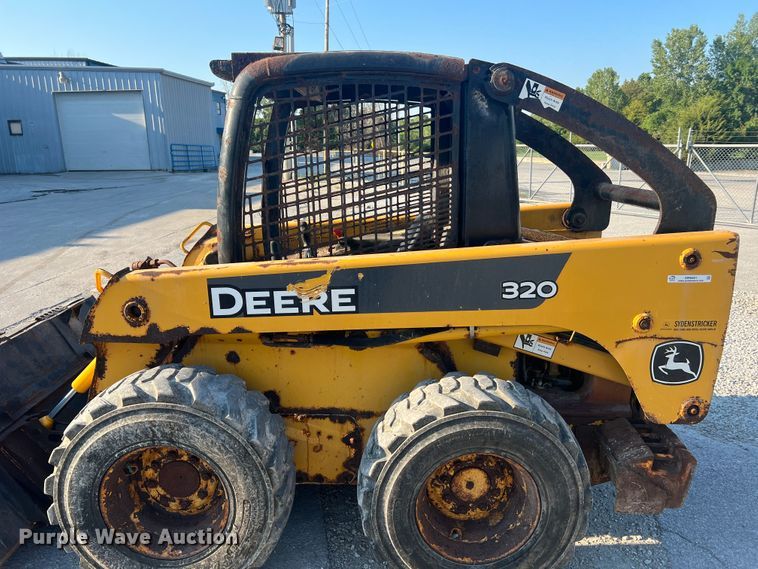 image for item MR9801 John Deere 320  skid steer loader