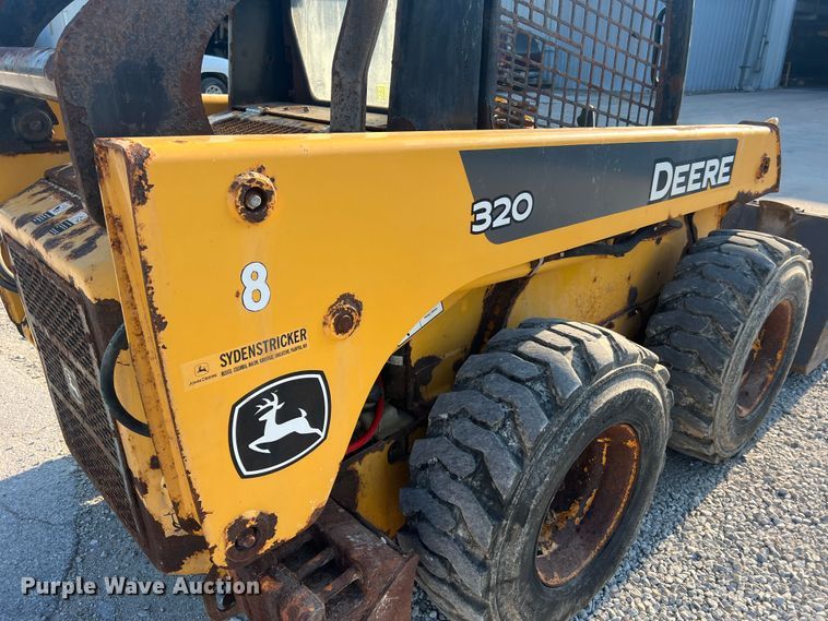 image for item MR9801 John Deere 320  skid steer loader