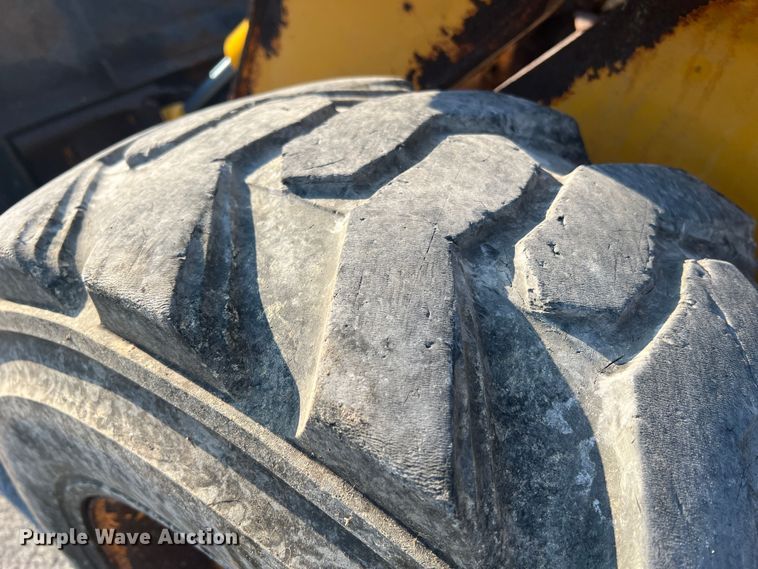 image for item MR9801 John Deere 320  skid steer loader