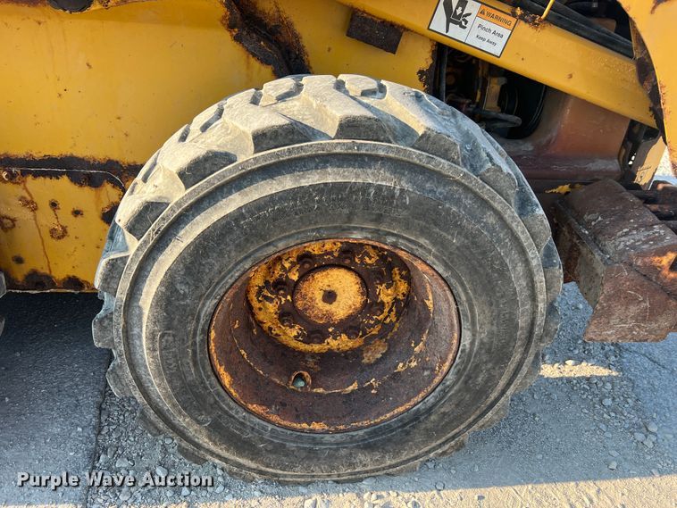 image for item MR9801 John Deere 320  skid steer loader