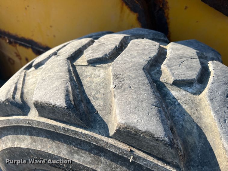 image for item MR9801 John Deere 320  skid steer loader