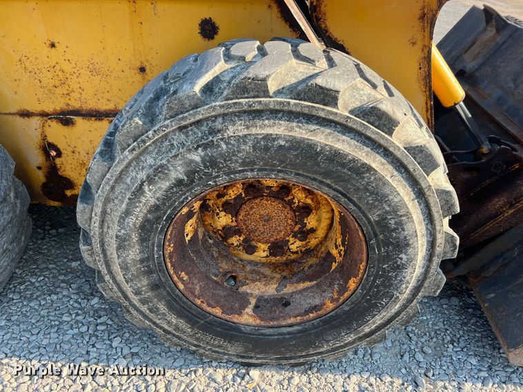 image for item MR9801 John Deere 320  skid steer loader