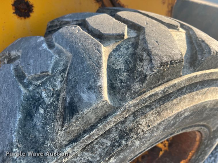 image for item MR9801 John Deere 320  skid steer loader