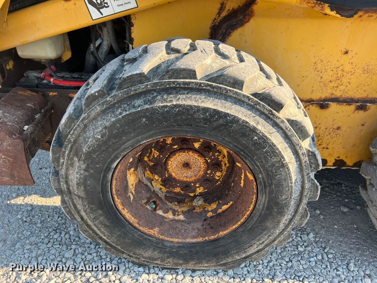 image for item MR9801 John Deere 320  skid steer loader