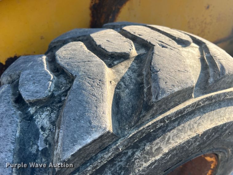 image for item MR9801 John Deere 320  skid steer loader