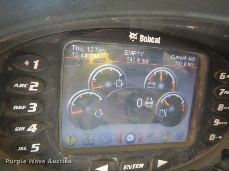 image for item DM3053 2014 Bobcat T750  tracked skid steer loader