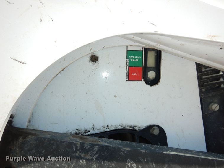 image for item DM3053 2014 Bobcat T750  tracked skid steer loader