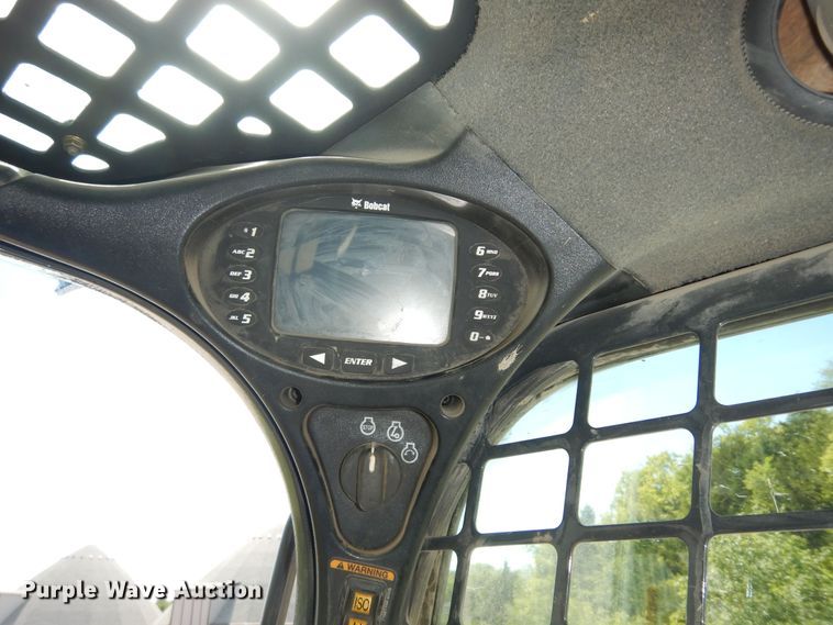 image for item DM3053 2014 Bobcat T750  tracked skid steer loader