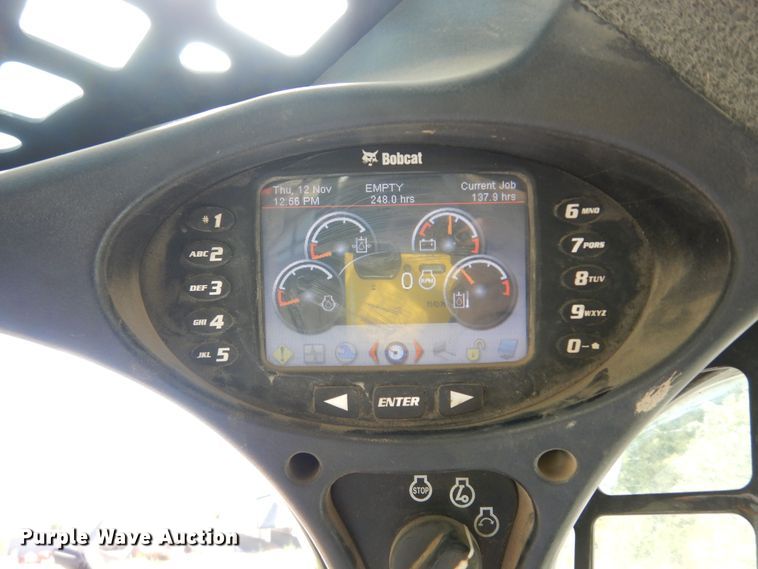 image for item DM3053 2014 Bobcat T750  tracked skid steer loader